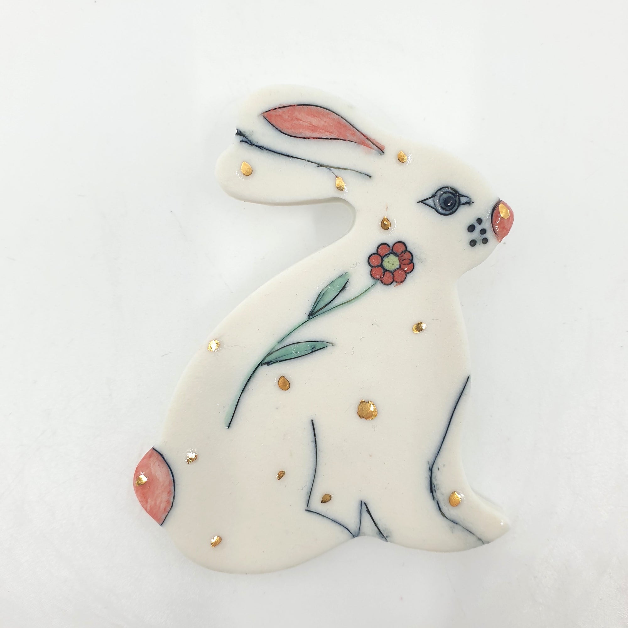 Rabbit with flowers brooch