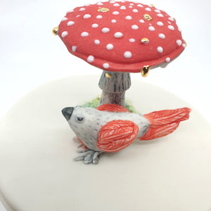 Porcelain sugar bowl with red finch and mushroom