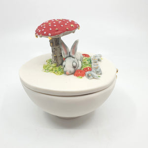 Porcelain sugar bowl with sleeping bunny