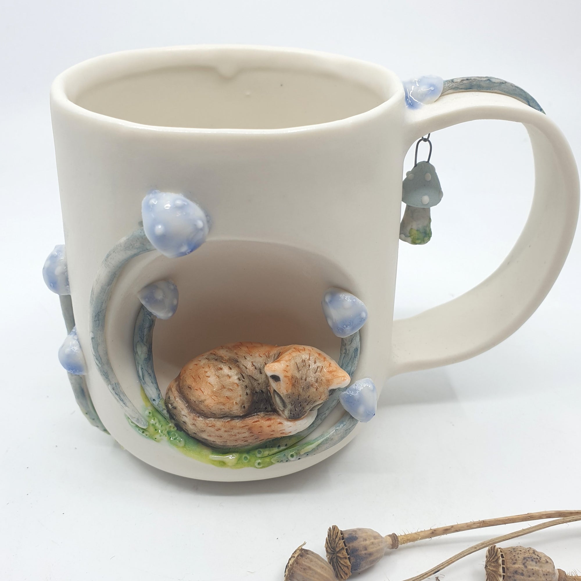 Porcelain fox mug with blue mushrooms (pastel)