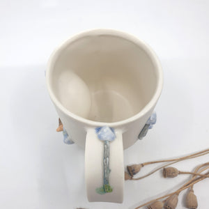 Porcelain fox mug with blue mushrooms (pastel)