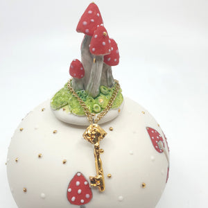 Mushroom orb/vase with ceramic gold key