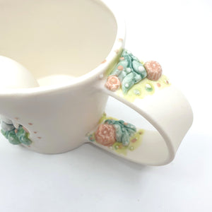 Porcelain bunny cup with apricot flowers