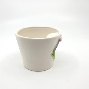 Porcelain cup with pink mushrooms and gold lustre