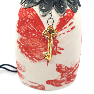 Bird bell with red butterflies and gold accents