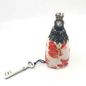 Bird bell with red butterflies and gold accents