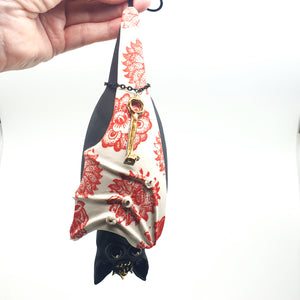 Ceramic bat hanging sculpture (red flowers)