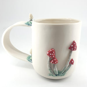 Porcelain fox mug with red mushrooms