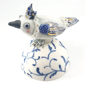 Baby Bird (white on blue floral stand)