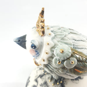 Baby Bird (green/blue bird on black and white floral stand)