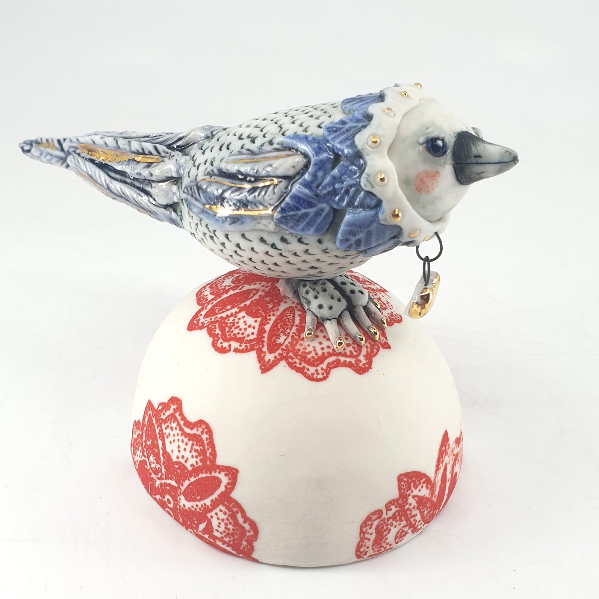 Baby Bird (blue/white on red floral stand) with gold heart