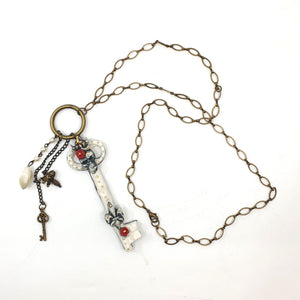 Large key necklace on oval link chain