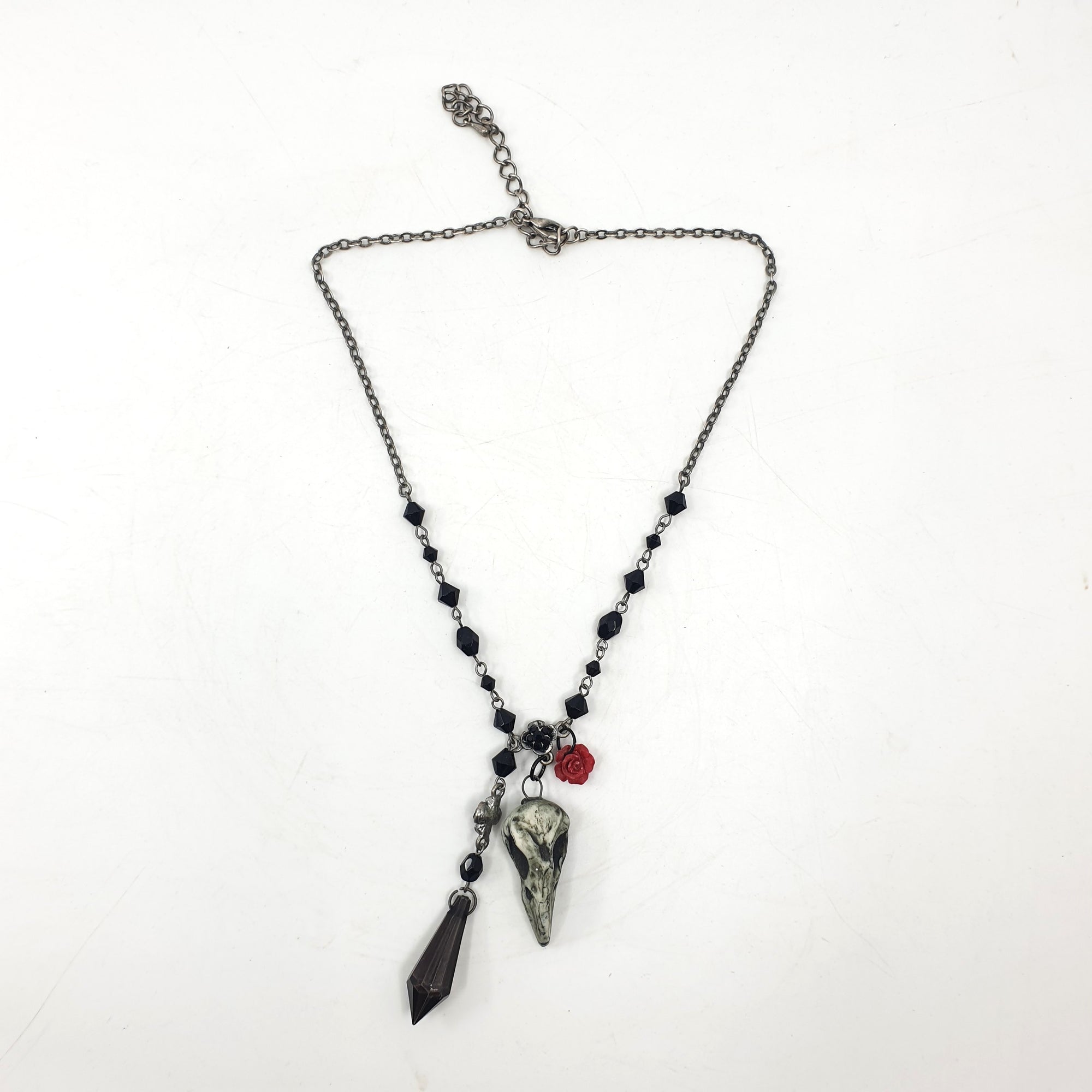 Bird skull necklace on vintage choker