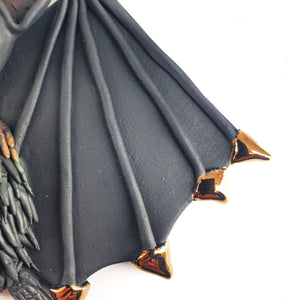 Flying bat (black with fur)