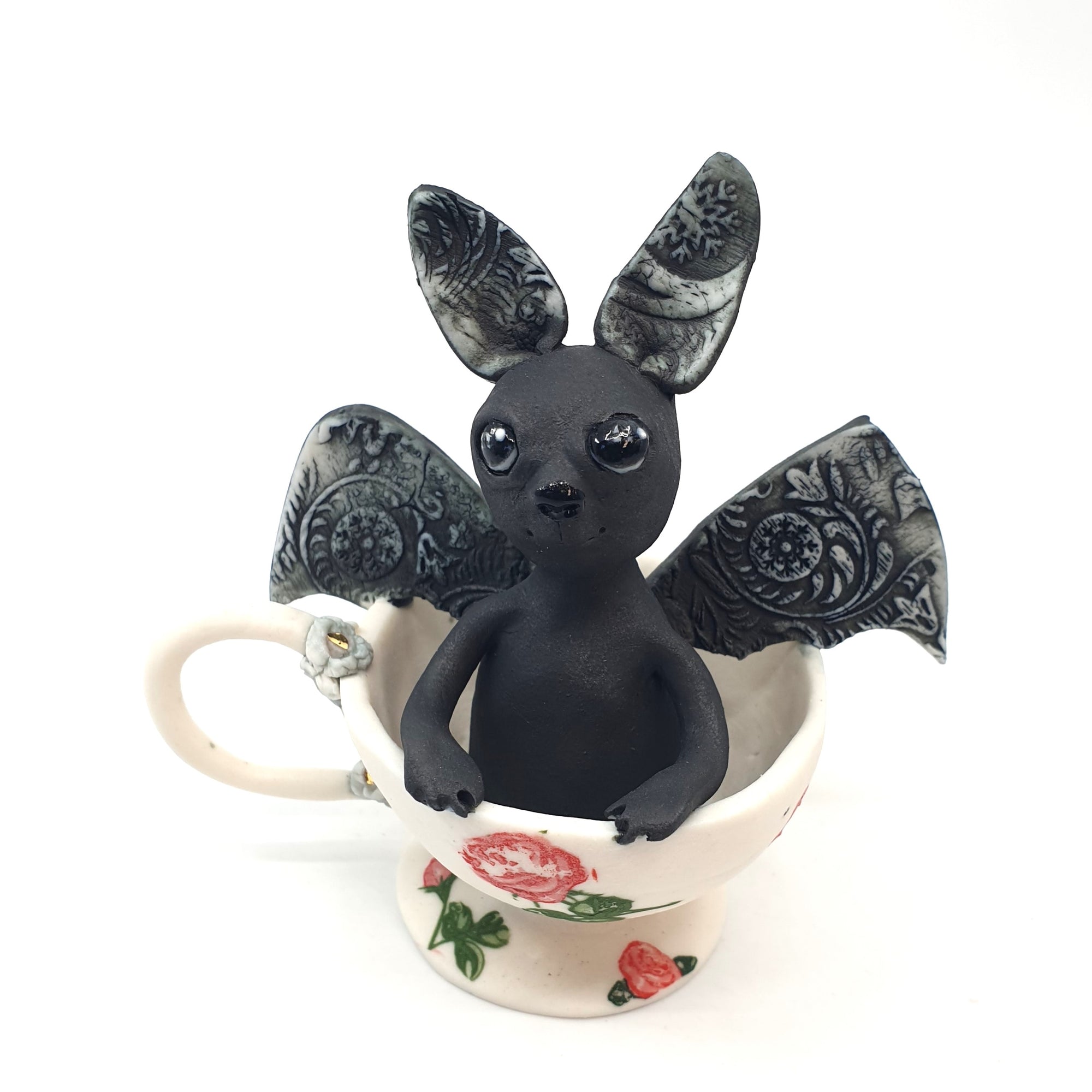 Baby bat in a teacup (roses)