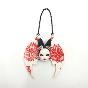 Hanging bat girl (red and white flowers)